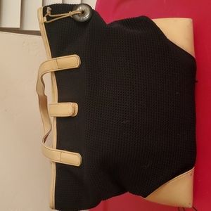 The Sak 90’s Style Knot Chord Bag with Leather Accents.